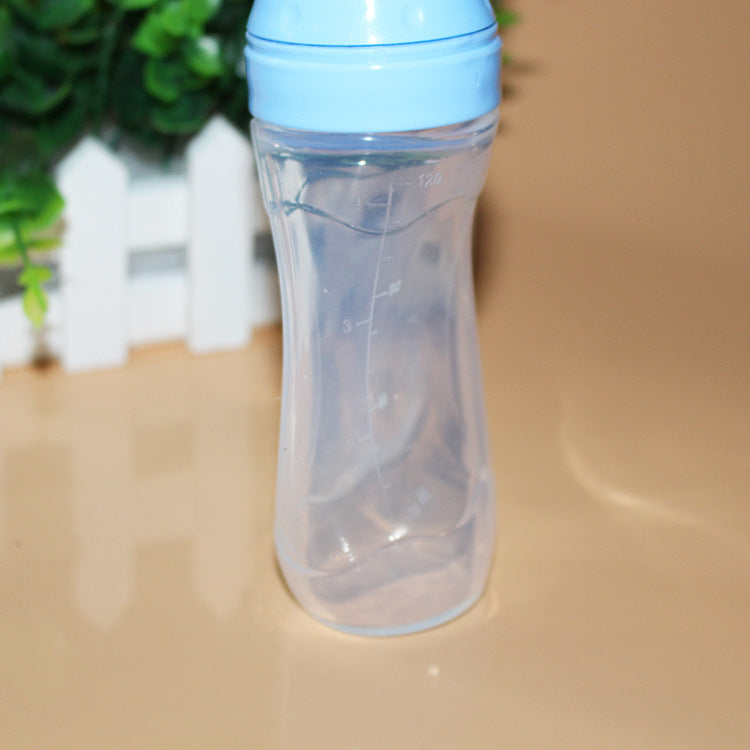 Baby silicone feeding spoon bottle 120ml with squeeze design, ideal for feeding puree and baby food.