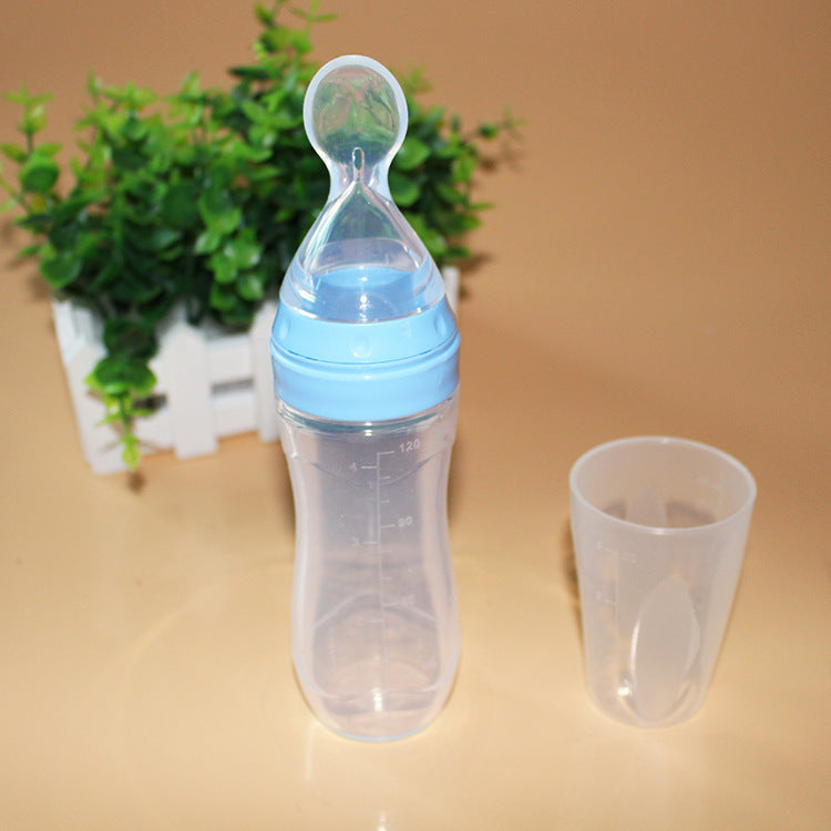 Baby silicone feeding spoon bottle 120ml with squeeze design, ideal for feeding puree and baby food.