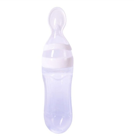 Baby silicone feeding spoon bottle 120ml with squeeze design, ideal for feeding puree and baby food.