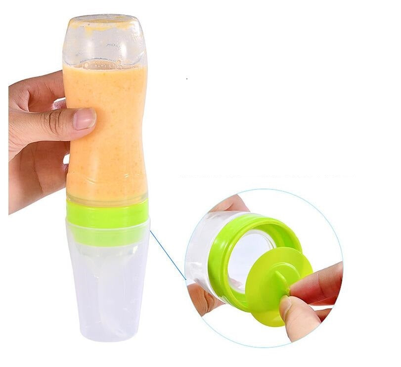 Baby silicone feeding spoon bottle 120ml with squeeze design, ideal for feeding puree and baby food.
