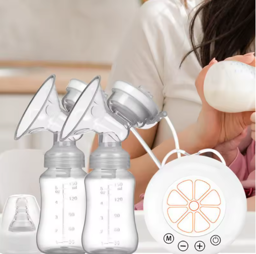 Electric breastfeeding pump with 2 milk bottles on table