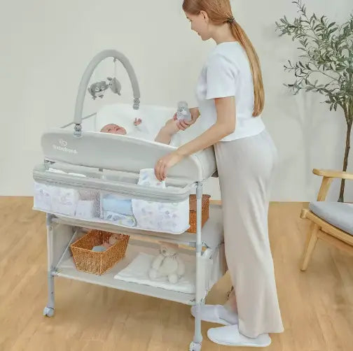 Waterproof PVC baby changing station with safety straps and wheels